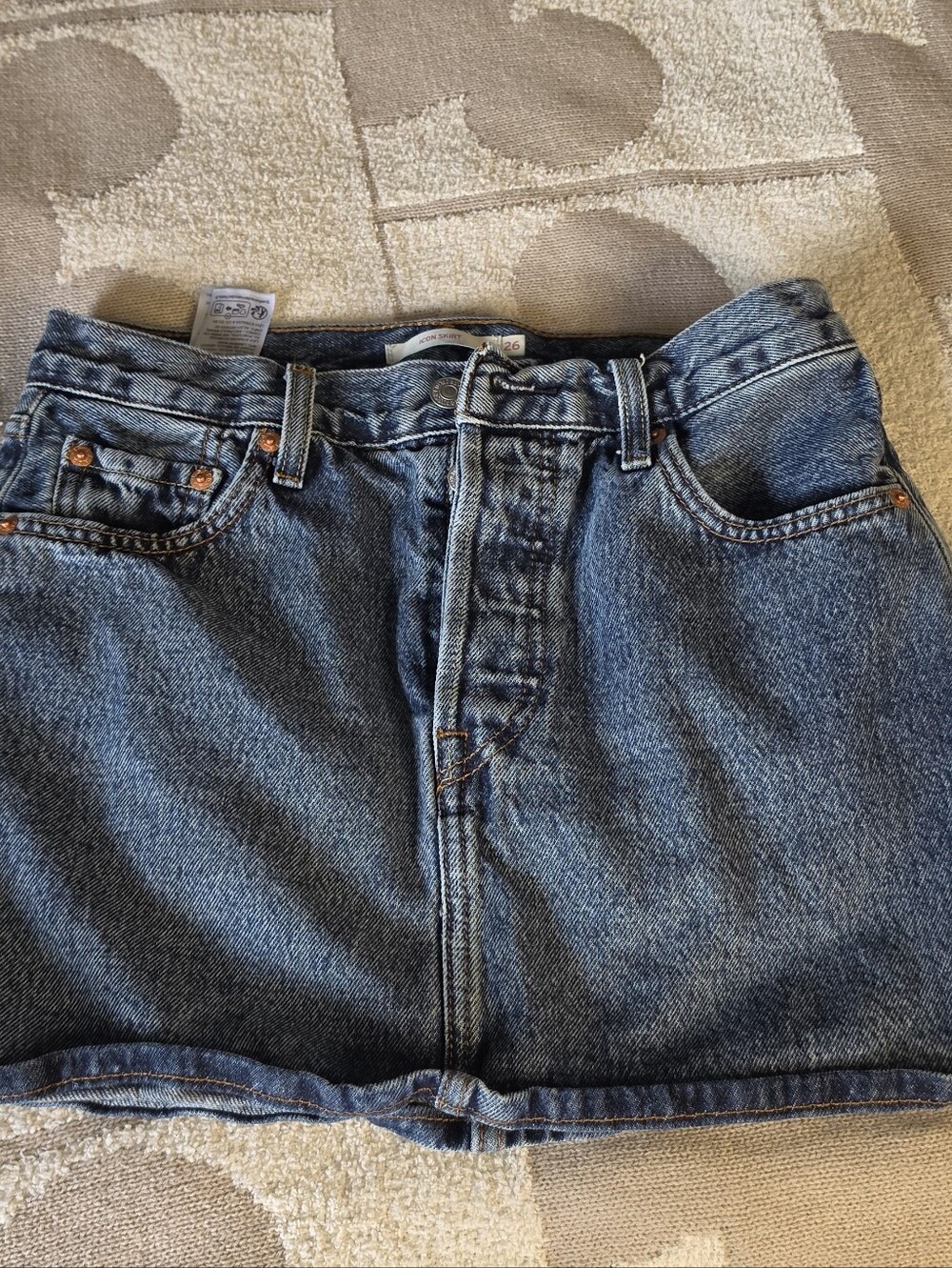 ICON Distressed Blue Denim Mini Skirt with Copper Hardware
